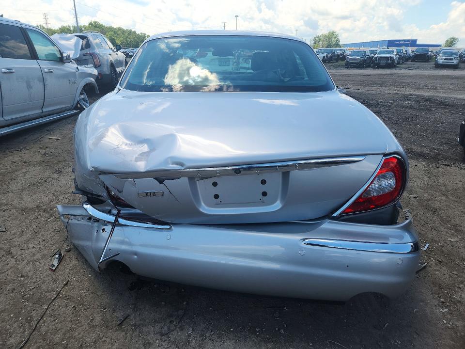 2004 Jaguar Xj series VIN SAJEA71C94SG06738 COPART salvage auction — REAR END, MI - CERTIFICATE OF TITLE, sold $500 on 2026-07-14 (photo 6)