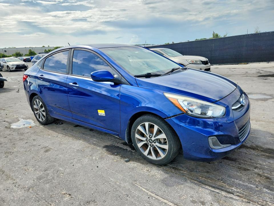 2017 Hyundai Accent VIN KMHCT4AE2HU251737 COPART salvage auction — WATER/FLOOD, Fl - Cert Of Title-Slvg Rebld Flood, sold $725 on 2026-07-14 (photo 4)