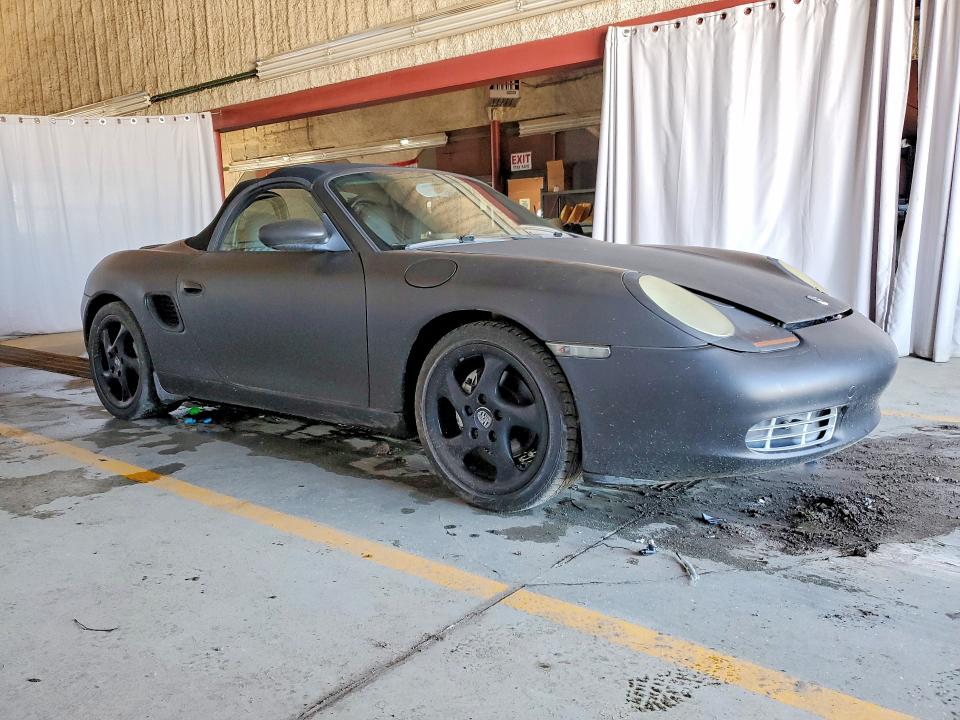 1999 Porsche Boxster VIN WP0CA2985XU629545 COPART salvage auction — NORMAL WEAR, In - Cert Of Title - Rebuilt Vehicl, sold $1,300 on 2026-08-04 (photo 4)