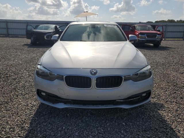 2017 BMW VIN WBA8B9G36HNU51964 COPART salvage auction — MINOR DENT/SCRATCHES, Fl - Cert Of Ttl-Rebuilt&Slvg Rbld, sold $3,300 on 2026-07-07 (photo 5)