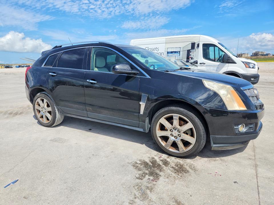 2012 Cadillac Srx VIN 3GYFNBE36CS500374 COPART salvage auction — WATER/FLOOD, Fl - Cert Of Title Slvg Rebuildable, sold $875 on 2026-07-22 (photo 4)