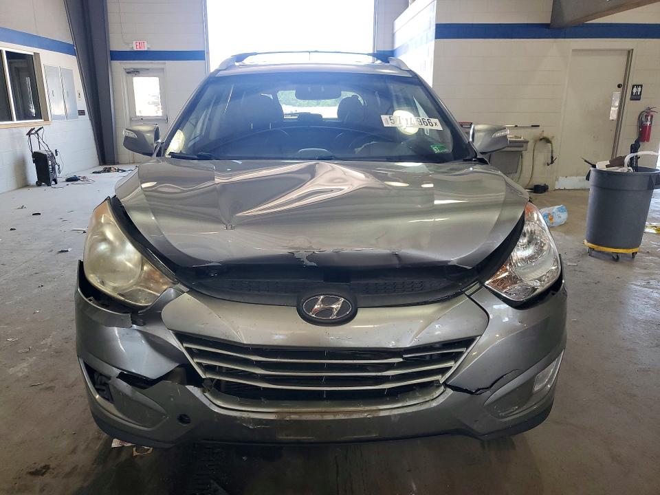 2013 Hyundai Tucson VIN KM8JU3AC2DU591980 COPART salvage auction — FRONT END, VA - CERT OF TITLE - SALVAGE, sold $800 on 2026-07-02 (photo 5)