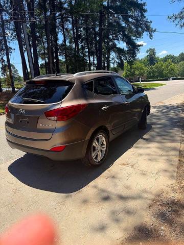 2010 Hyundai Tucson VIN KM8JU3AC9AU040098 COPART salvage auction — NORMAL WEAR, Nc - Dealer Only Clean Title (P), sold $850 on 2026-07-02 (photo 4)