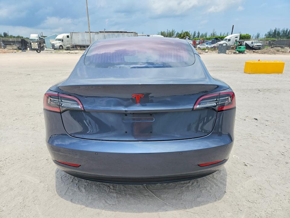 2018 Tesla Model 3 VIN 5YJ3E1EA1JF009525 COPART salvage auction — MINOR DENT/SCRATCHES, Fl - Certificate Of Title, sold $6,200 on 2026-07-07 (photo 6)