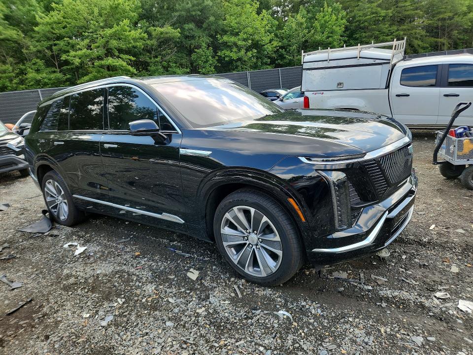 2026 Cadillac Xt4 VIN 1GYC3KML8TZ701349 COPART salvage auction — SIDE, Id - Salvage Certificate Of Title, sold $25,750 on 2026-08-14 (photo 4)