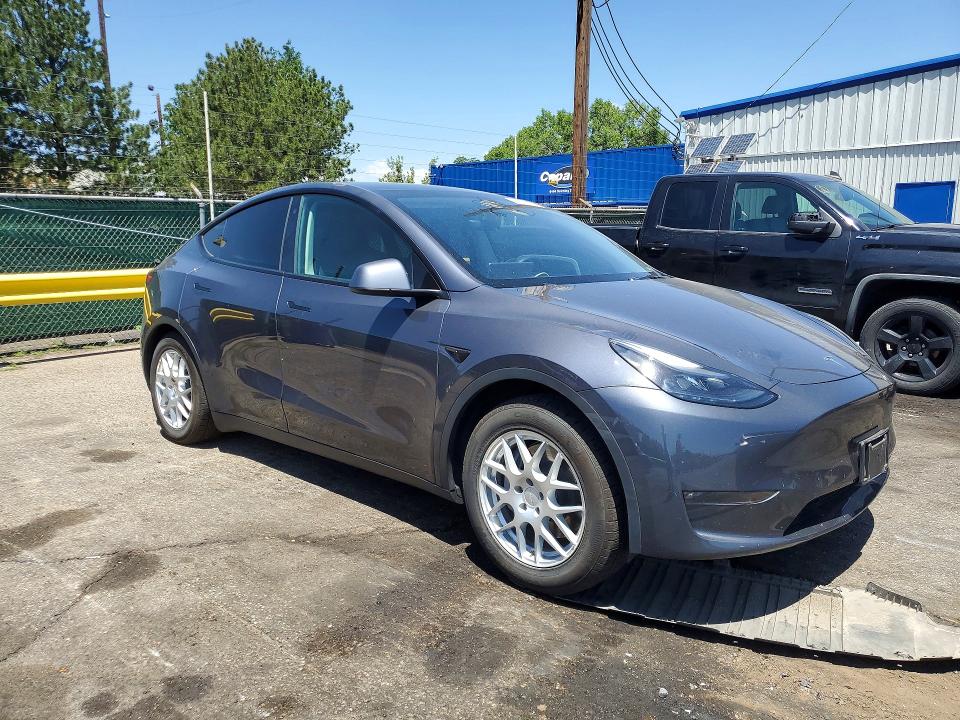 2023 Tesla Model y VIN 7SAYGAEE4PF595636 COPART salvage auction — FRONT END, Co - Public - Salvage Title, sold $300 on 2026-07-30 (photo 4)