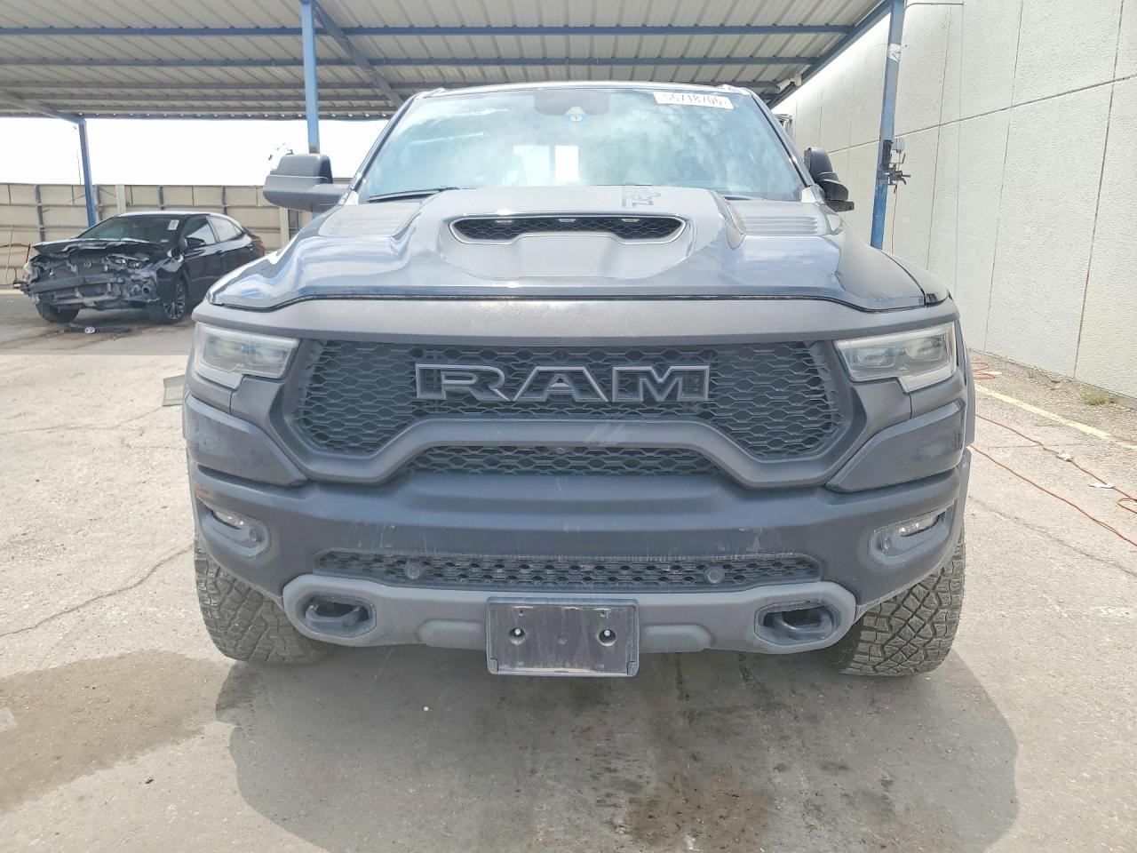 2023 Ram 1500 VIN 1C6SRFU91PN511442 COPART salvage auction — Minor Dent/Scratches, TX - CERTIFICATE OF TITLE, sold $74,500 on 2026-06-26 (photo 5)