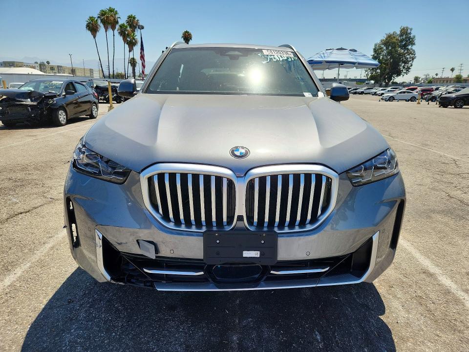 2026 BMW VIN 5UX13EU01T9319926 COPART salvage auction — SIDE, CA - SALVAGE CERTIFICATE, sold $23,100 on 2026-07-24 (photo 5)