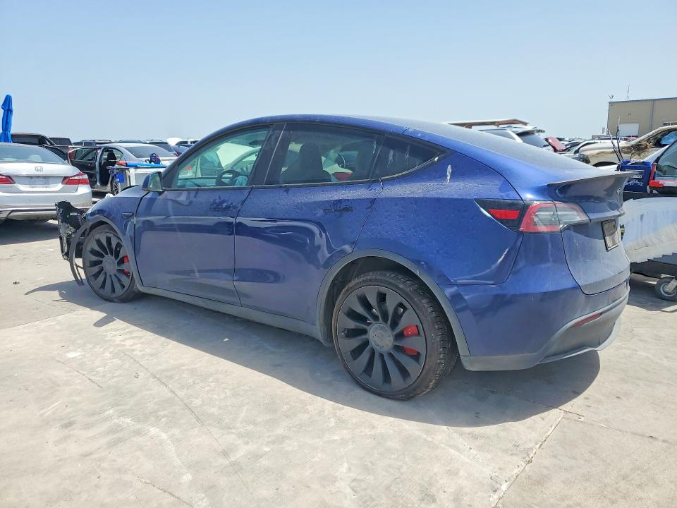 2023 Tesla Model y VIN 7SAYGDEF2PF749870 COPART salvage auction — FRONT END, TX - SALVAGE VEHICLE TITLE, sold $9,500 on 2026-07-20 (photo 2)