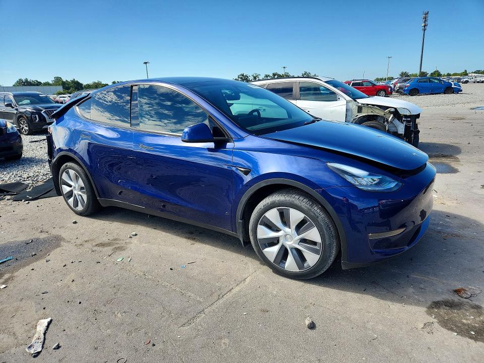 2023 Tesla VIN 7SAYGDEE5PA157836 COPART salvage auction — REAR END, Fl - Cert Of Title Slvg Rebuildable, sold $9,400 on 2026-07-27 (photo 4)