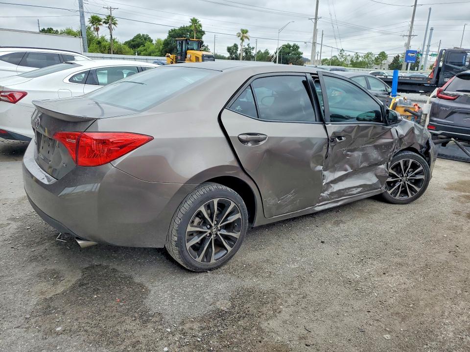 2019 Toyota Corolla VIN 5YFBURHE8KP904883 COPART salvage auction — SIDE, Fl - Cert Of Title Slvg Rebuildable, sold $2,600 on 2026-07-28 (photo 3)