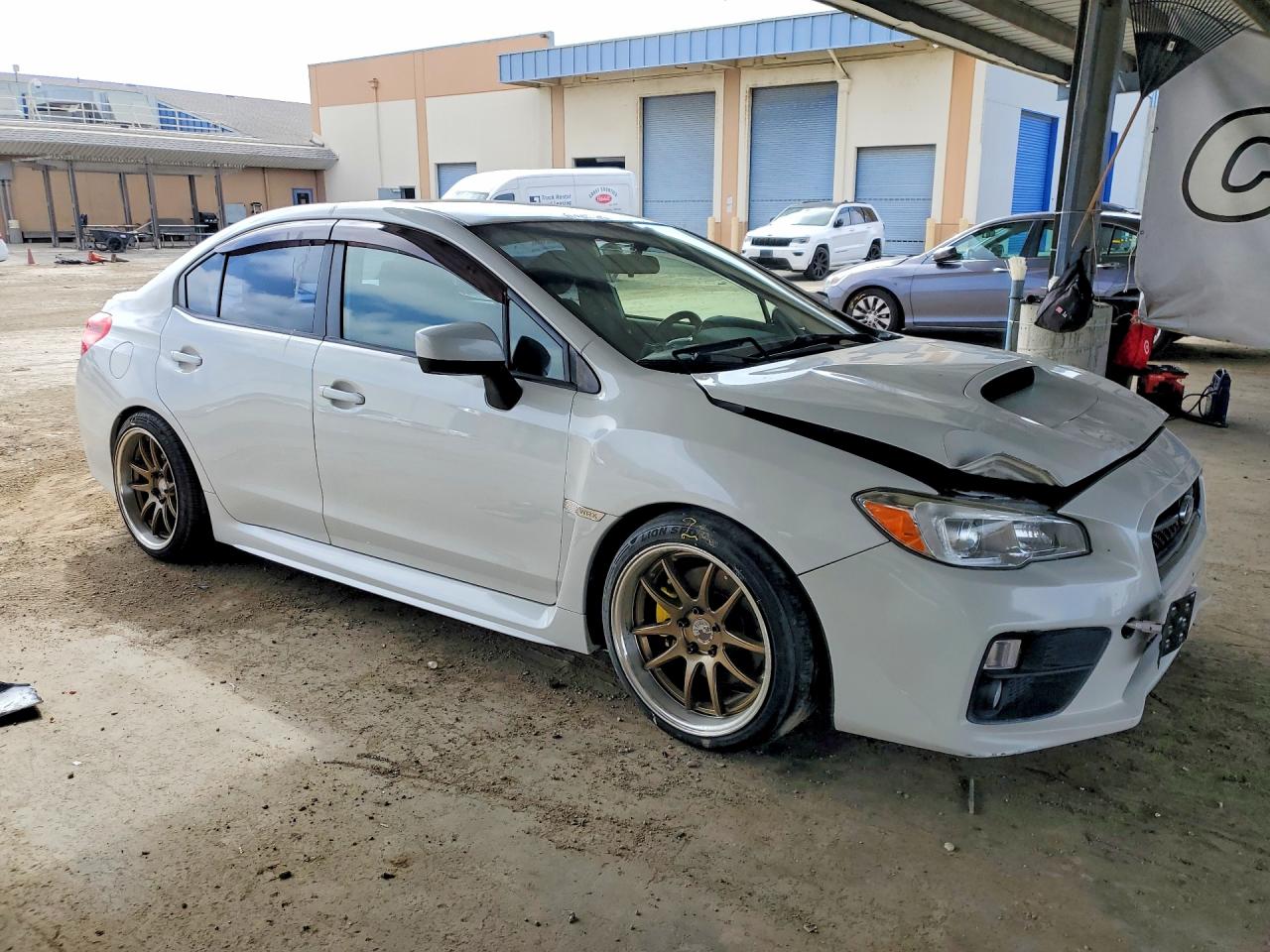 2017 Subaru VIN JF1VA1E64H8803130 COPART salvage auction — Rear End, CA - SALVAGE CERTIFICATE, sold $1,650 on 2026-09-08 (photo 4)