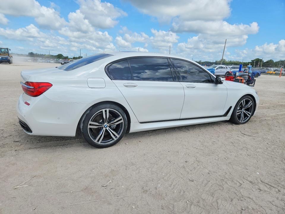 2016 BMW 7er VIN WBA7E2C58GG547860 COPART salvage auction — MINOR DENT/SCRATCHES, Fl - Certificate Of Title (P), sold $9,500 on 2026-07-10 (photo 3)