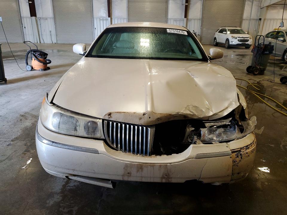 2001 Lincoln TOWN CAR VIN 1LNHM83W71Y701168 COPART salvage auction — FRONT END, MN - CERT OF TITLE-PRIOR SALVAGE, sold $70 on 2026-07-27 (photo 5)