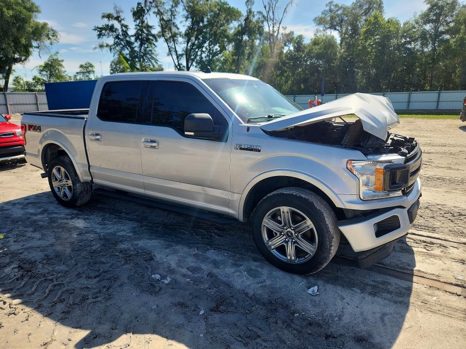 2019 Ford F-150 lightning VIN 1FTEW1E56KKC31202 COPART salvage auction — FRONT END, OK - CERTIFICATE OF TITLE, sold $9,400 on 2026-09-09 (photo 4)