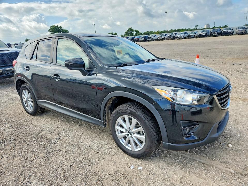 2016 Mazda VIN JM3KE2CY4G0606927 COPART salvage auction — REAR END, Tx - Salvage Vehicle Title, sold $80 on 2026-07-29 (photo 4)
