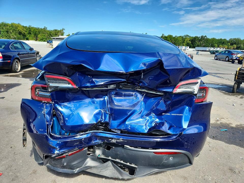 2023 Tesla VIN 7SAYGDEE5PA157836 COPART salvage auction — REAR END, Fl - Cert Of Title Slvg Rebuildable, sold $9,400 on 2026-07-27 (photo 6)