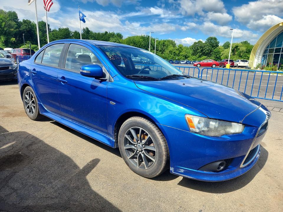 2015 Mitsubishi Lancer VIN JA32V2FW7FU025155 COPART salvage auction — MINOR DENT/SCRATCHES, Ny - Certificate Of Title, sold $475 on 2026-07-10 (photo 4)