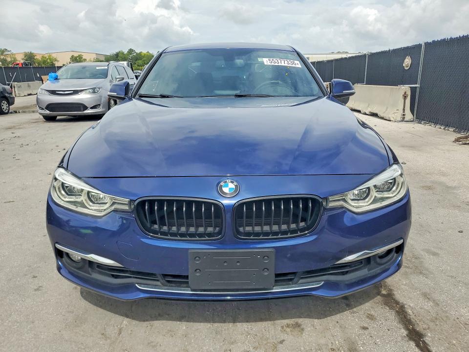 2018 BMW 3 series VIN WBA8B9C55JEE81053 COPART salvage auction — REAR END, Fl - Certificate Of Title, sold $5,700 on 2026-07-07 (photo 5)