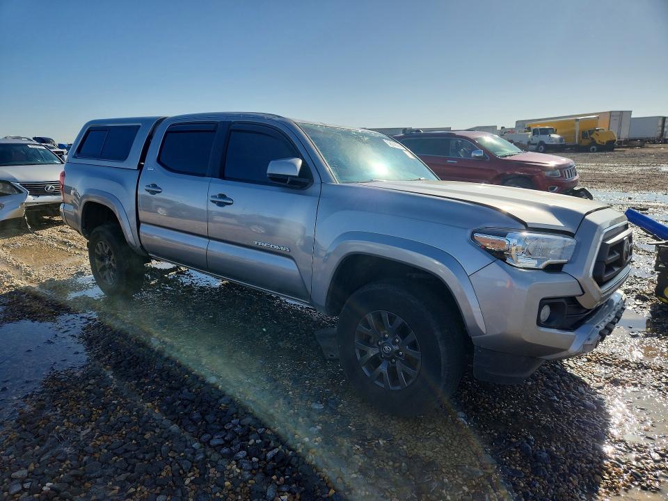 2021 Toyota Tacoma VIN 5TFAZ5CN2MX100113 COPART salvage auction — ROLLOVER, Tx - Salvage Vehicle Title, sold $8,100 on 2026-07-14 (photo 4)