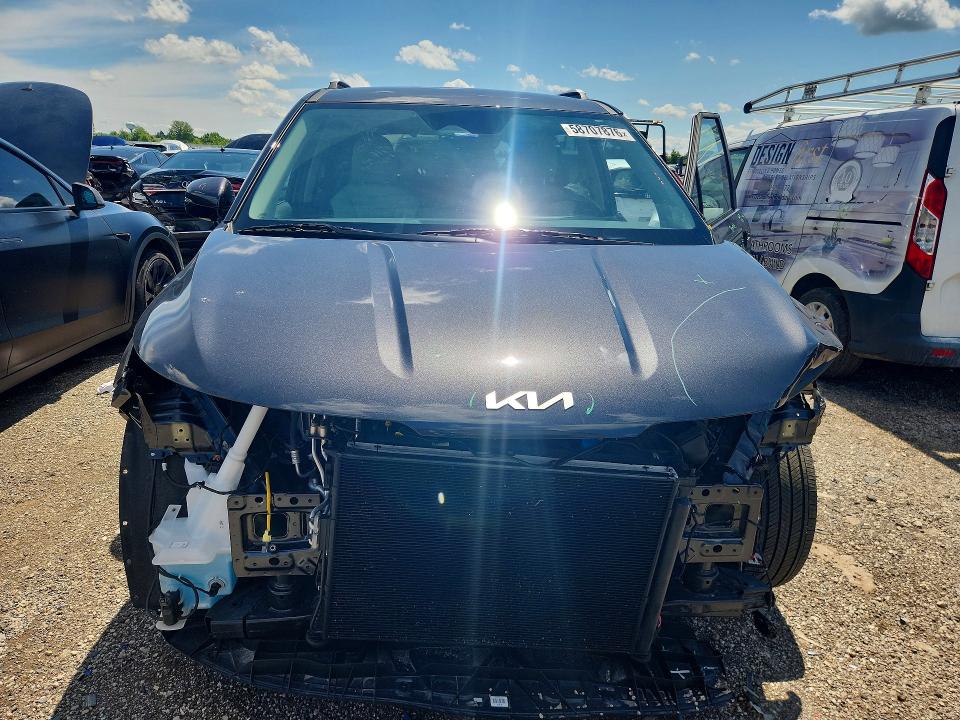 2025 Kia VIN KNDNC5K39S6458735 COPART salvage auction — FRONT END, Il - Salvage Certificate, sold $10,900 on 2026-07-30 (photo 5)