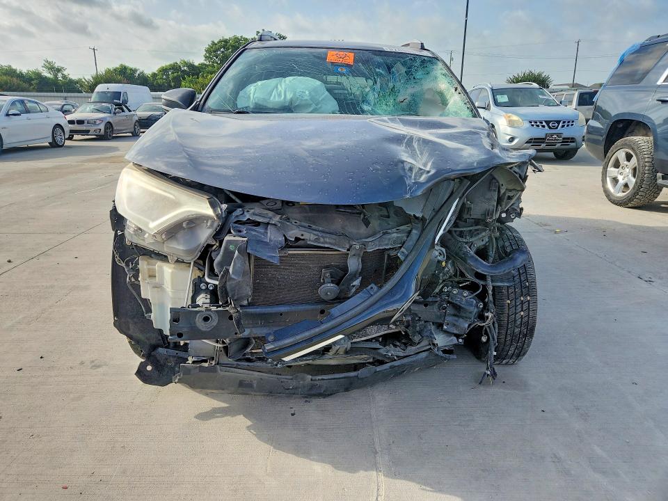 2017 Toyota Rav 4 VIN JTMZFREV5HD094654 COPART salvage auction — SIDE, TX - SALVAGE VEHICLE TITLE (P), sold $1,800 on 2026-07-23 (photo 5)