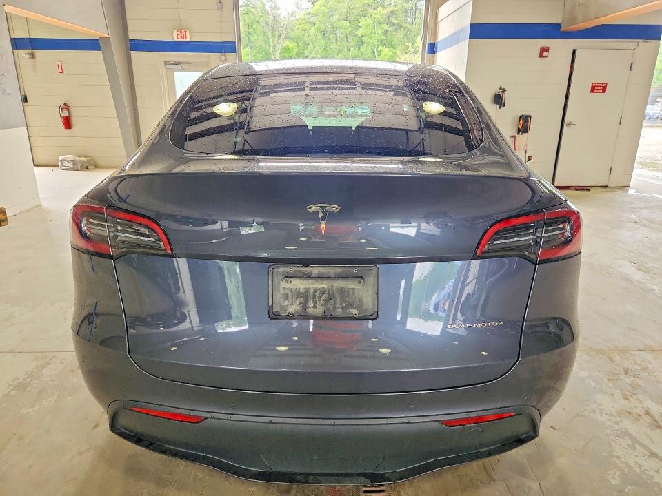 2022 Tesla Model y VIN 7SAYGDEE9NA005510 COPART salvage auction — NORMAL WEAR, Va - Cert Of Title - Salvage, sold $2,550 on 2026-07-24 (photo 6)