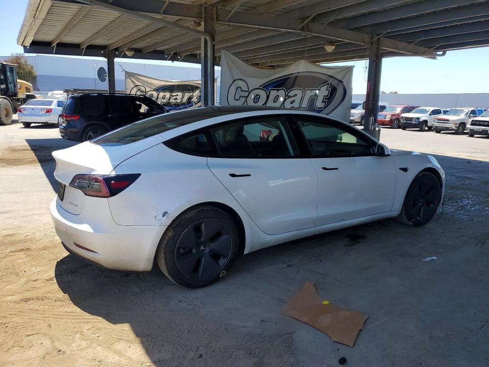 2023 Tesla VIN 5YJ3E1EB8PF388444 COPART salvage auction — REAR END, CA - SALVAGE CERTIFICATE, sold $8,500 on 2026-07-02 (photo 3)