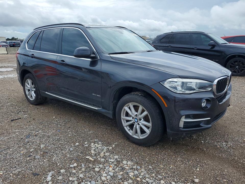 2015 BMW VIN 5UXKR0C59F0K69630 COPART salvage auction — MINOR DENT/SCRATCHES, Tx - Certificate Of Title (P), sold $1,100 on 2026-07-09 (photo 4)