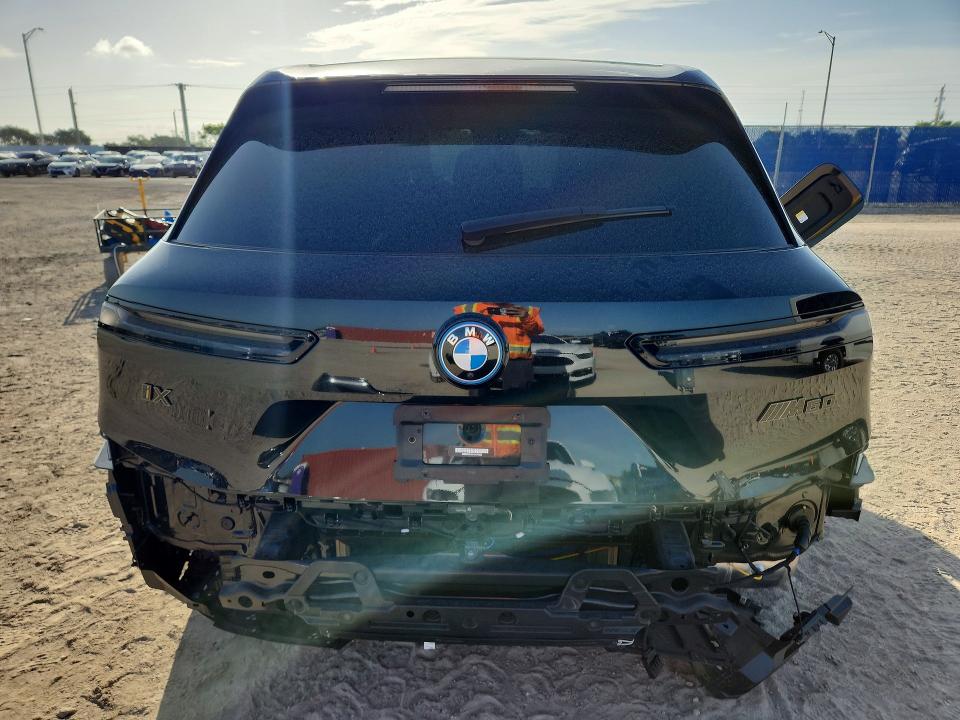 2023 BMW Ix VIN WB533CF0XPCM75950 COPART salvage auction — REAR END, Fl - Cert Of Title Slvg Rebuildable, sold $35,750 on 2026-08-19 (photo 6)