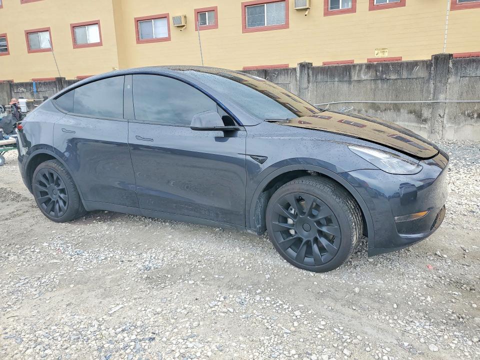 2024 Tesla VIN 7SAYGDEE5RF037184 COPART salvage auction — SIDE, Fl - Cert Of Title Slvg Rebuildable, sold $10,300 on 2026-07-28 (photo 4)