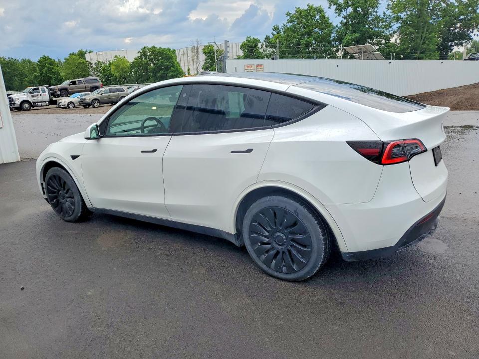 2023 Tesla Model y VIN 7SAYGDEE1PF611177 COPART salvage auction — REAR END, Ny - Cert Of Title-Rebuilt Salvage, sold $14,300 on 2026-07-06 (photo 2)