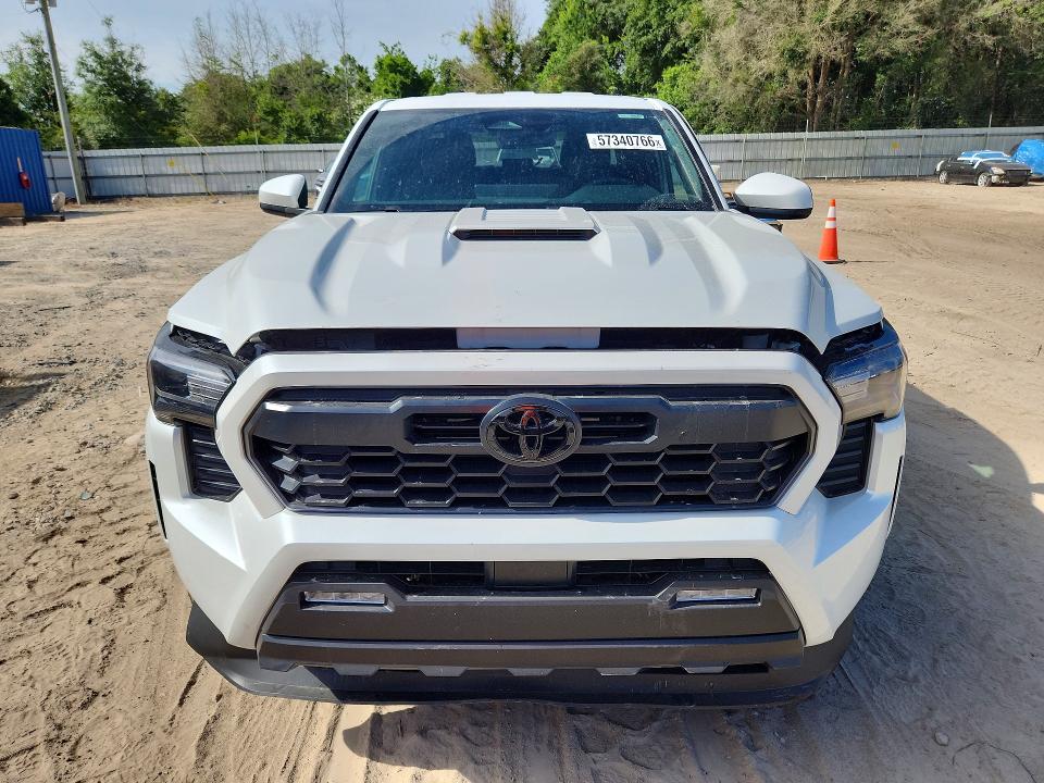 2026 Toyota Tacoma VIN 3TYLC5LN7TT057763 COPART salvage auction — SIDE, Fl - Cert Of Title Slvg Rebuildable, sold $16,700 on 2026-07-31 (photo 5)