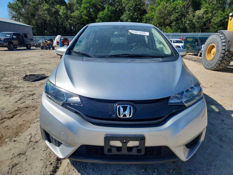 2016 Honda Fit VIN JHMGK5H55GX036739 COPART salvage auction — SIDE, Fl - Cert Of Title Slvg Rebuildable, sold $2,900 on 2026-07-10 (photo 5)
