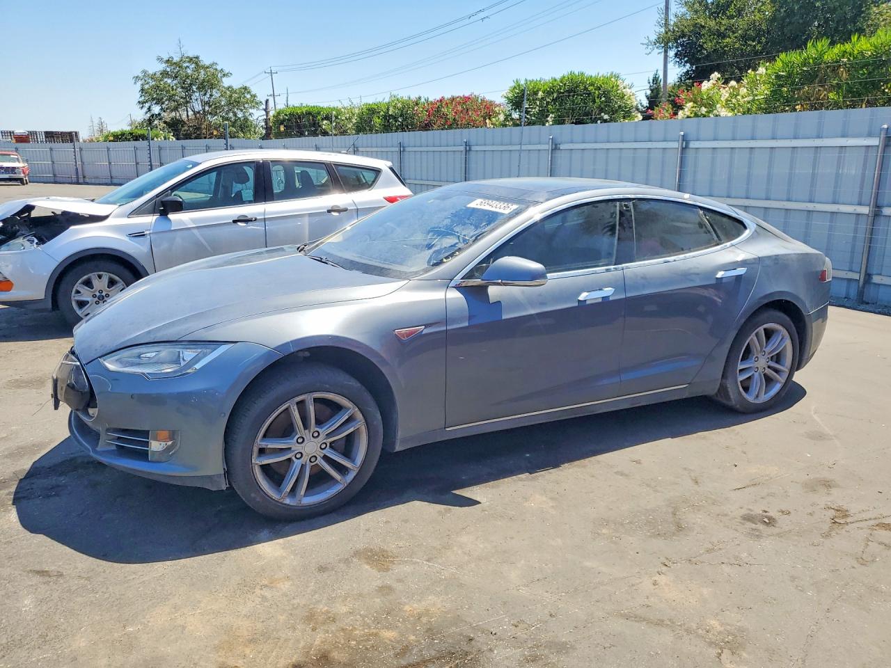 2013 Tesla Model S VIN 5YJSA1CP4DFP23684 — COPART salvage auction photo
