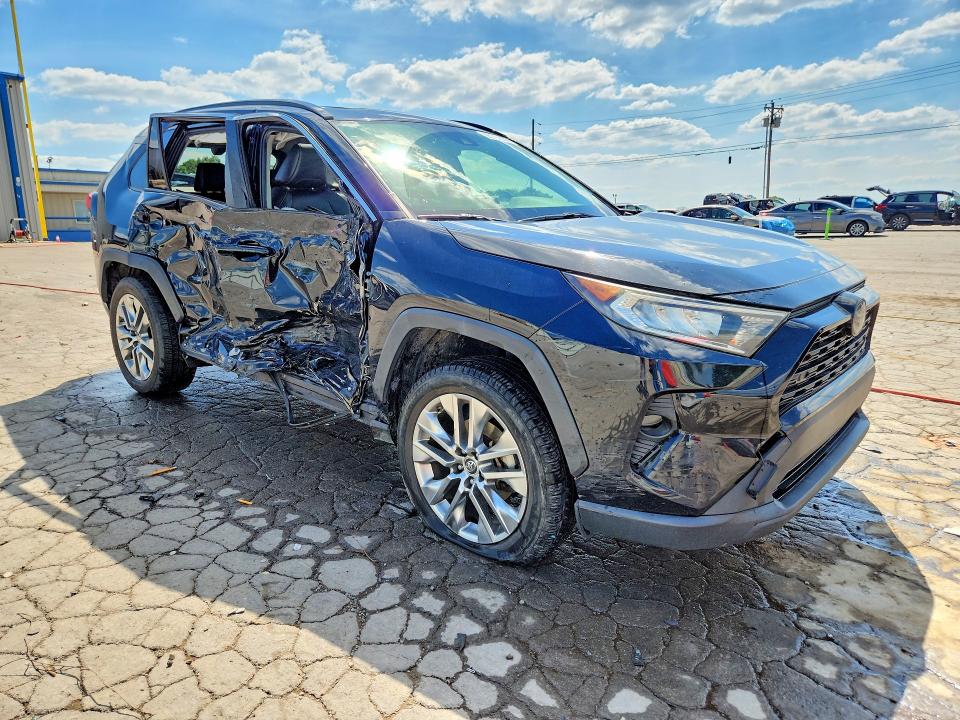 2019 Toyota Rav 4 VIN JTMA1RFV4KD516463 COPART salvage auction — SIDE, Tn - Salvage Certificate, sold $8,400 on 2026-07-27 (photo 4)