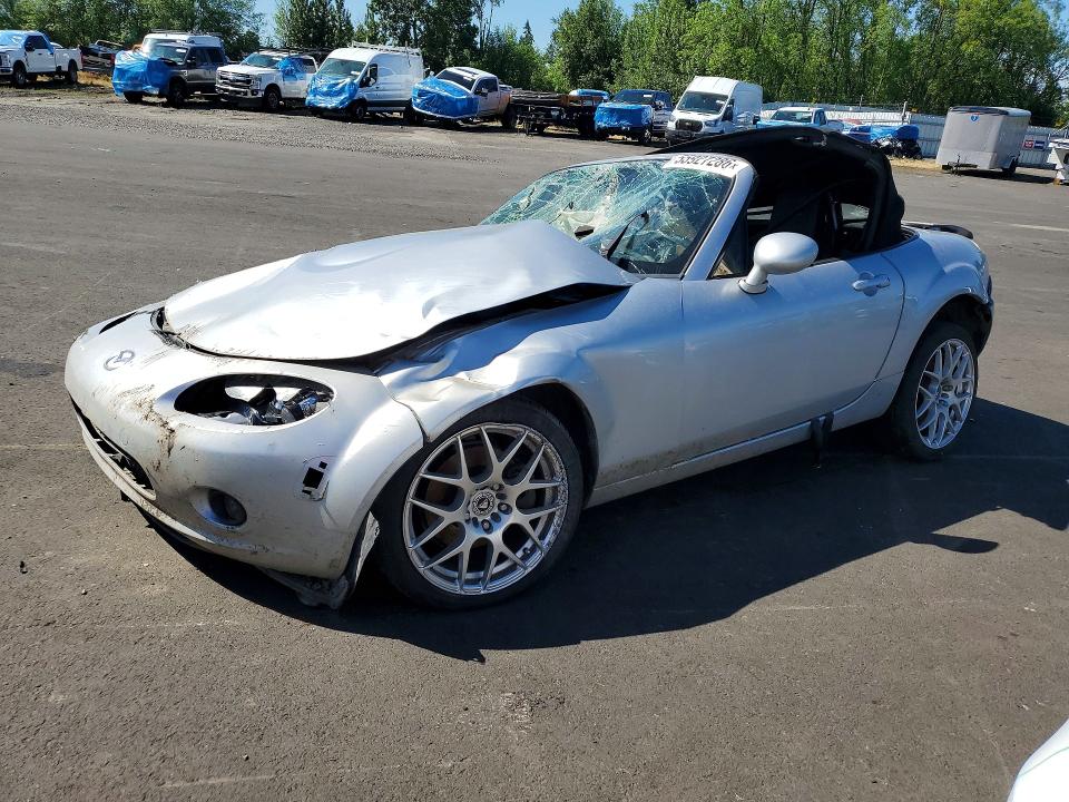 2007 Mazda Mx-5 VIN JM1NC25F570131697 COPART salvage auction — ROLLOVER, Or - Wrecker's Notice (Parts Only), sold $350 on 2026-07-13 (photo 1)