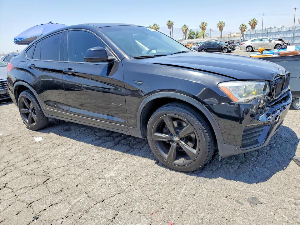2015 BMW X4 VIN 5UXXW3C52F0M87389 COPART salvage auction — FRONT END, Fl - Dis/Dlr/Exp Only Clean Title, sold $4,800 on 2026-07-30 (photo 4)
