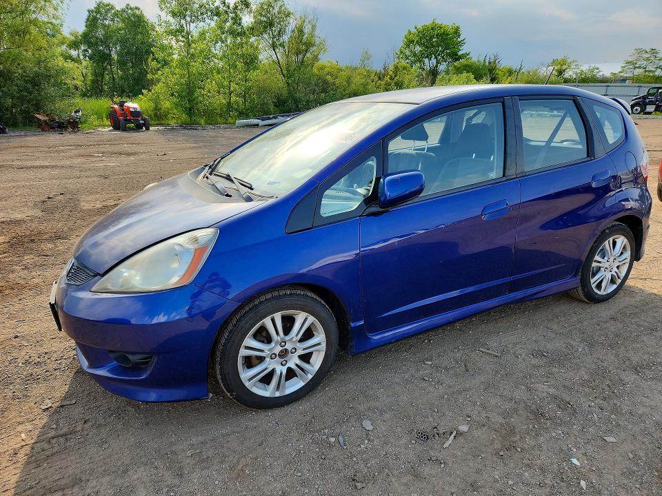 2009 Honda Fit VIN JHMGE88459S049118 COPART salvage auction — SIDE, Oh - Cert Of Title-Salvage, sold $750 on 2026-07-16 (photo 1)