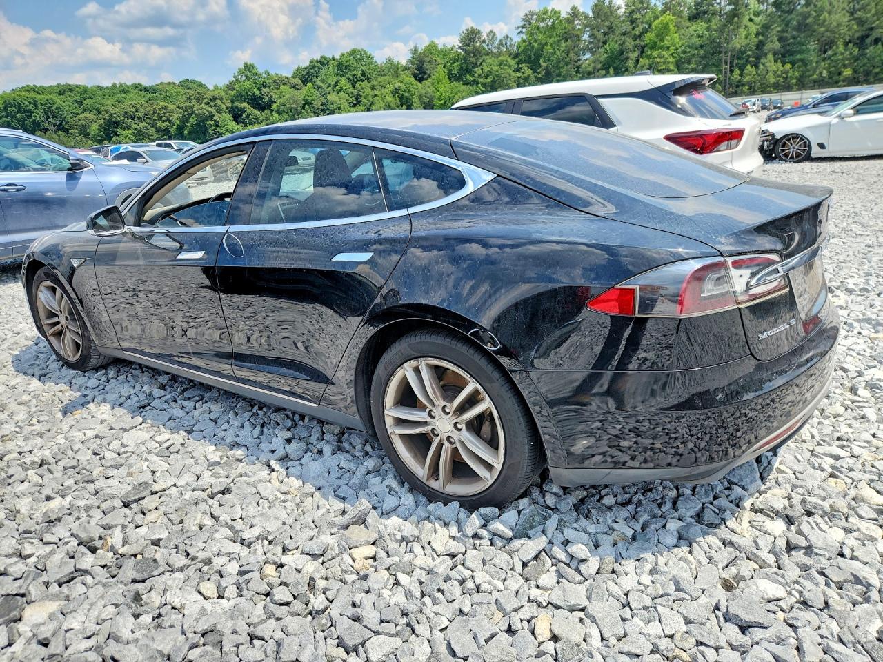 2013 Tesla Model S VIN 5YJSA1CG9DFP07786 COPART salvage auction — Mechanical, GA - CERTIFICATE OF TITLE (P), sold $850 on 2026-07-03 (photo 2)