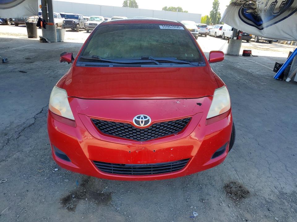 2010 Toyota Yaris VIN JTDBT4K38A4068264 COPART salvage auction — BURN, CA - NON-REPAIRABLE VEHICLE CERT, sold $100 on 2026-07-09 (photo 5)