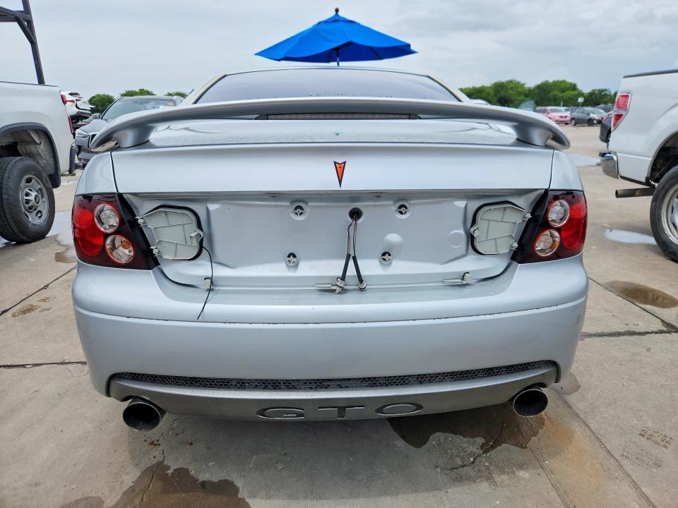 2005 Pontiac Gto VIN 6G2VX12U25L406771 COPART salvage auction — SIDE, TX - SALVAGE VEHICLE TITLE (P), sold $6,900 on 2026-07-16 (photo 6)