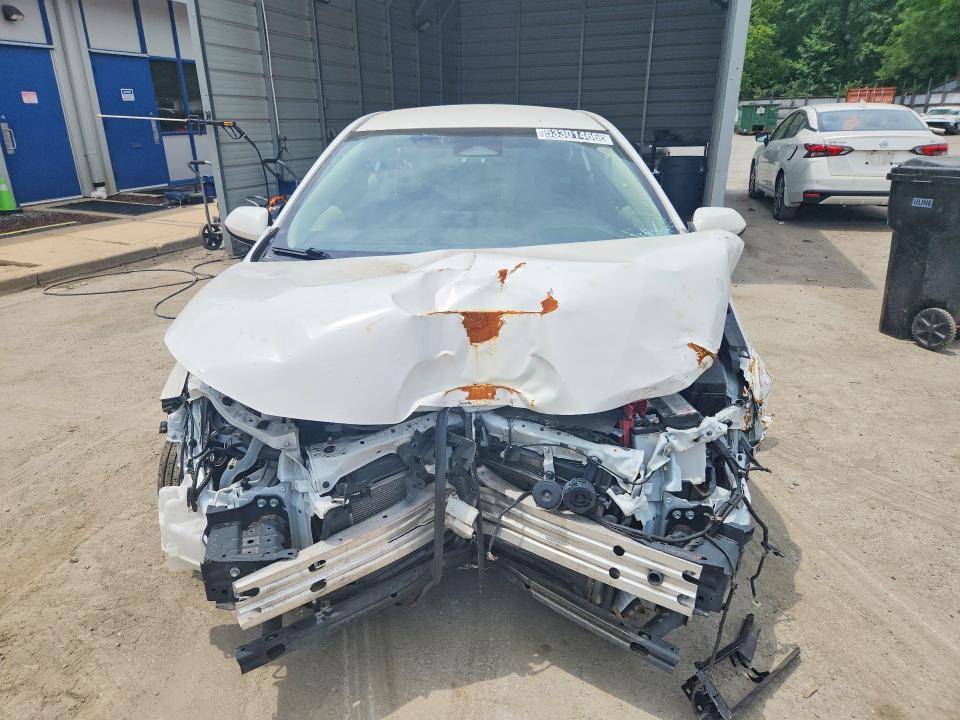 2023 Toyota Corolla VIN JTDBCMFE1PJ014682 COPART salvage auction — NORMAL WEAR, Va - Cert Of Title - Salvage, sold $3,050 on 2026-07-07 (photo 5)