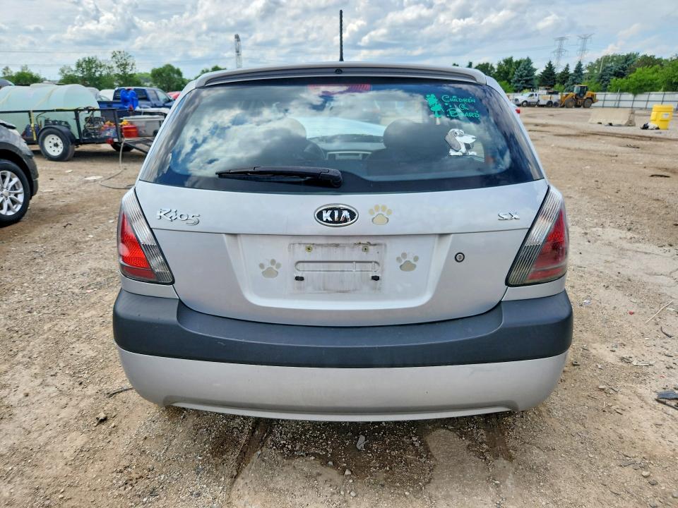 2009 Kia Rio VIN KNADE243196493150 COPART salvage auction — FRONT END, IL - SALVAGE CERTIFICATE, sold $250 on 2026-07-28 (photo 6)