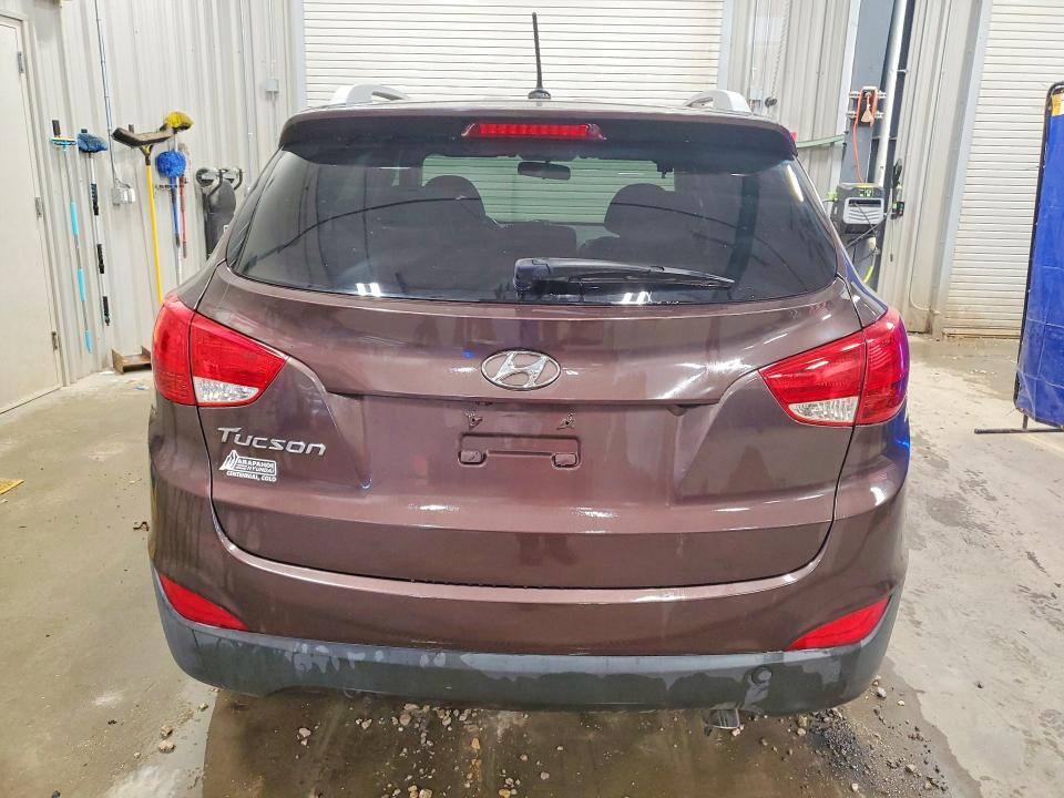 2014 Hyundai Tucson VIN KM8JU3AG3EU934378 COPART salvage auction — NORMAL WEAR, Wy - Certificate Of Title, sold $600 on 2026-07-22 (photo 6)