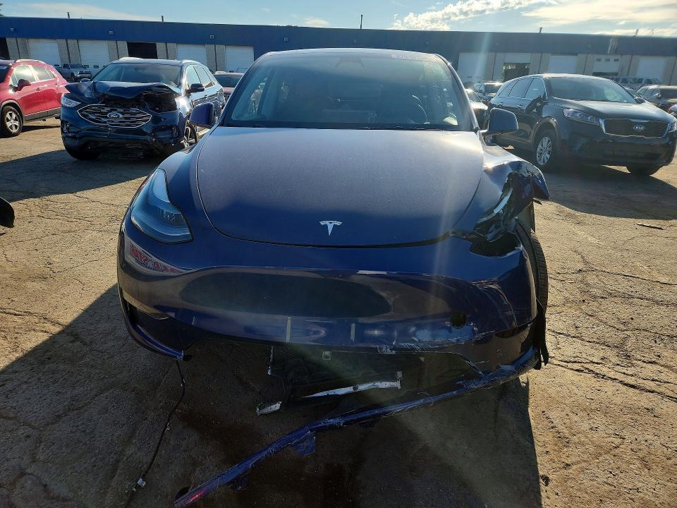 2023 Tesla Model y VIN 7SAYGAEE3PF789056 COPART salvage auction — FRONT END, Mi - Scrap Certificate Of Title, sold $2,550 on 2026-07-24 (photo 5)