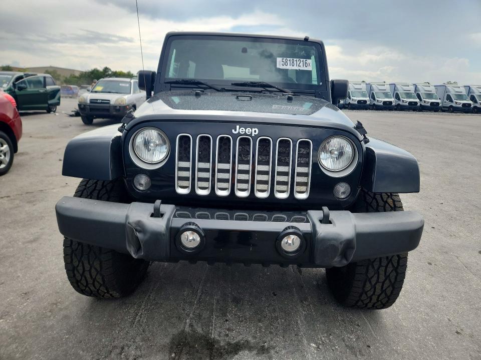 2016 Jeep Wrangler / VIN 1C4BJWEG7GL162814 COPART salvage auction — MECHANICAL, Fl - Certificate Of Title, sold $7,000 on 2026-07-30 (photo 5)