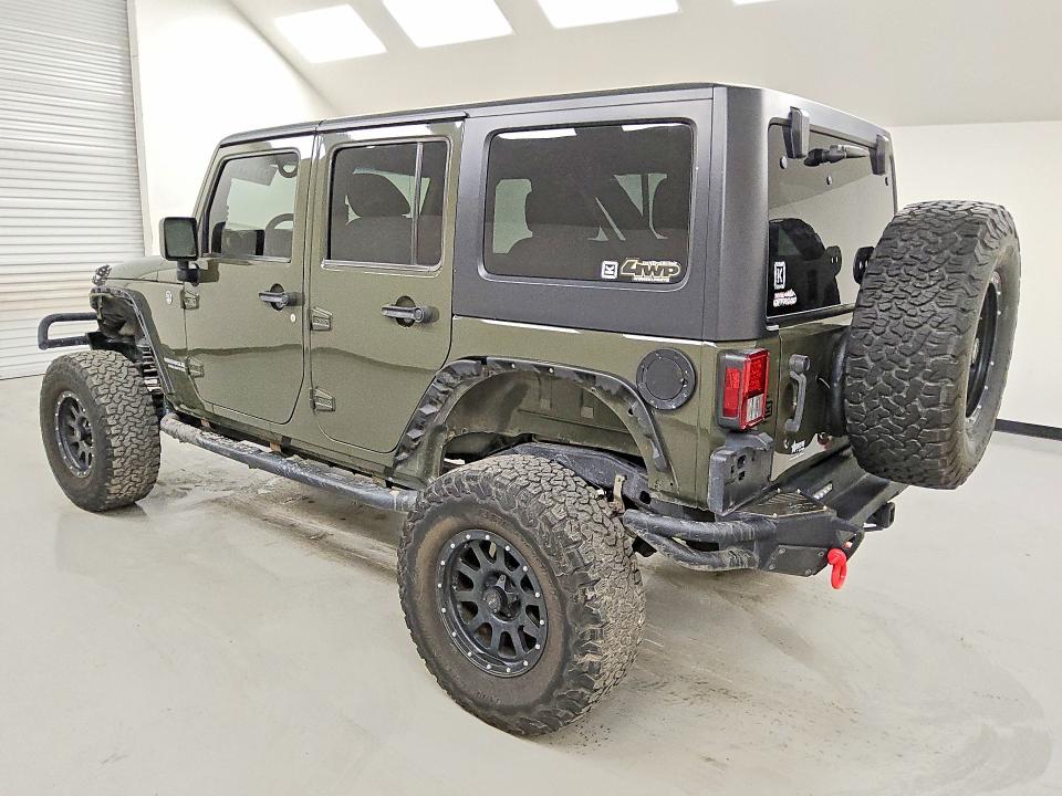 2015 Jeep Wrangler unlimited VIN 1C4BJWDG1FL760932 COPART salvage auction — MINOR DENT/SCRATCHES, Tx - Certificate Of Title, sold $3,750 on 2026-07-09 (photo 2)