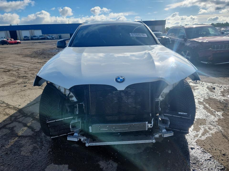 2021 BMW VIN 5YMUJ0C00M9F50093 COPART salvage auction — FRONT END, MI - CERTIFICATE OF TITLE, sold $26,750 on 2026-07-10 (photo 5)