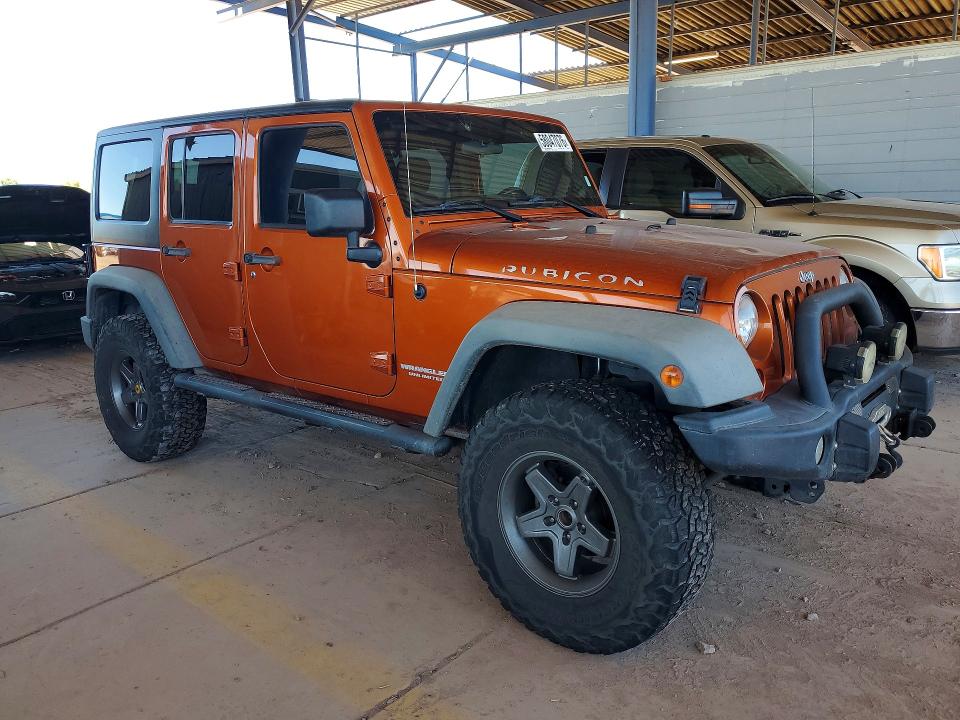 2011 Jeep Wrangler / VIN 1J4BA6H10BL505795 COPART salvage auction — ENGINE BURN, Az - Cert Of Title - Salvage, sold $4,950 on 2026-07-02 (photo 4)